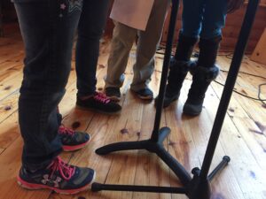 Four girls from the Assessment Center sing Amazing Grace at chapel