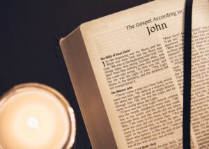 A Bible lays open to the Gospel of John